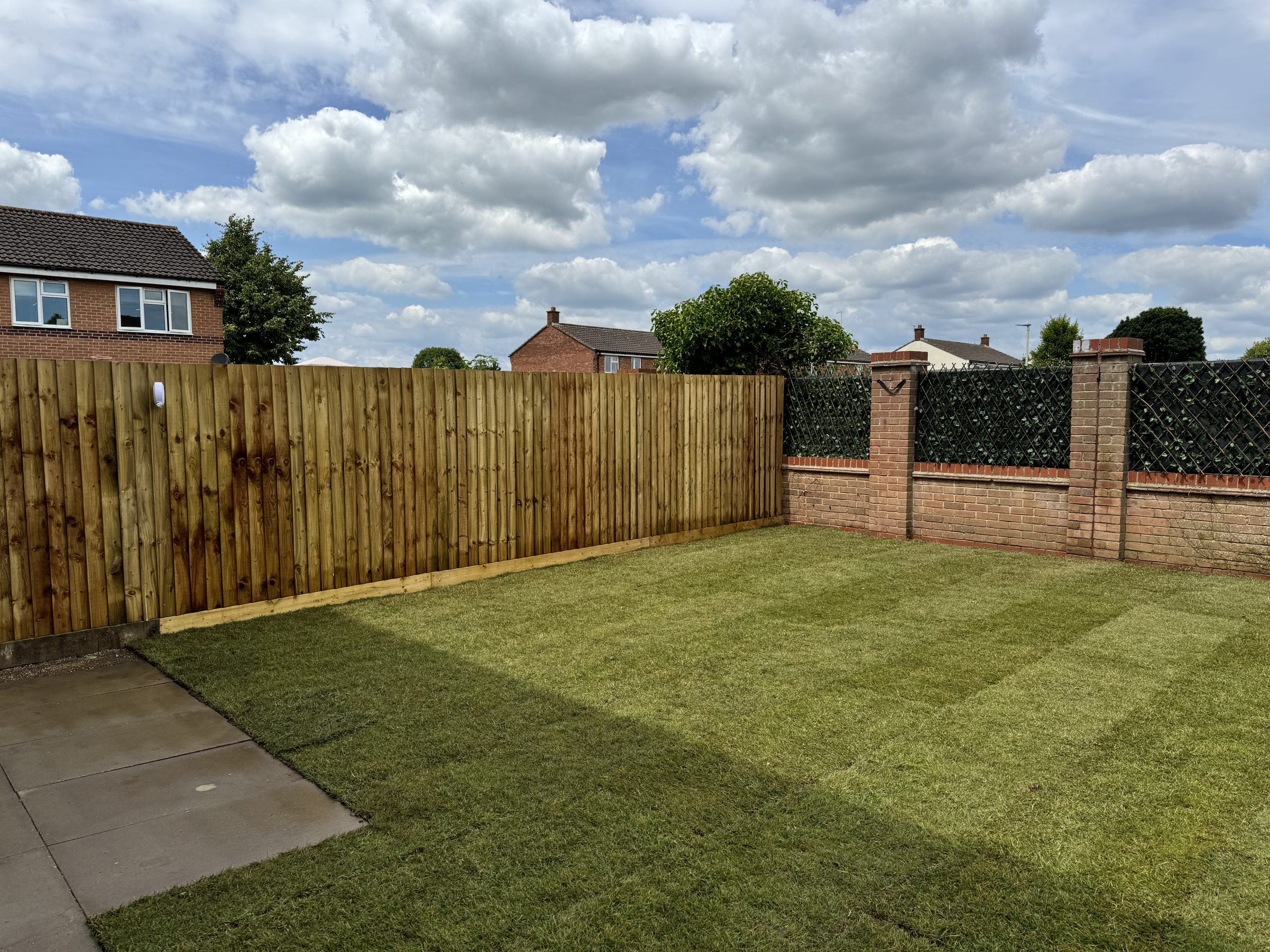 Fencing and turfing transformation in Springbank